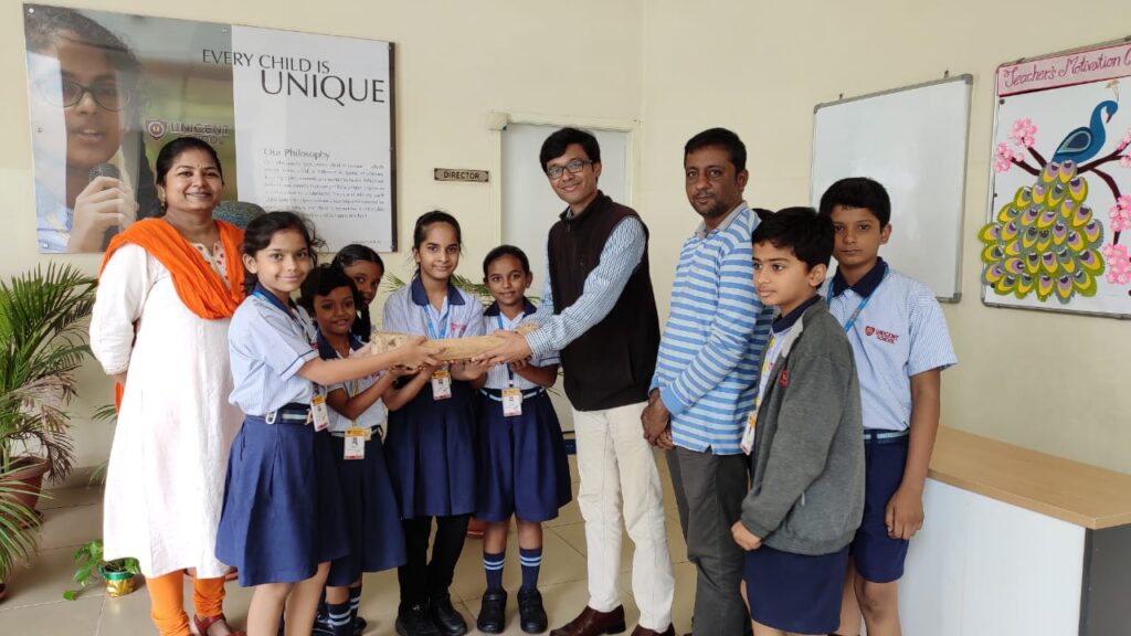 awbp trust distributed bamboo bird feeder to unicent students
